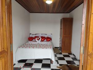 Ένα ή περισσότερα κρεβάτια σε δωμάτιο στο Flats Brancas Nuvens