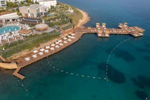 an aerial view of a resort on the water at Susona Bodrum, LXR Hotels & Resorts in Bodrum City