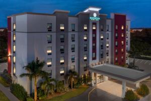 a rendering of a mgm hotel at night at Magnolia Pointe; BW Signature Collection in Sarasota