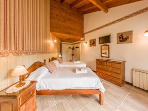 Cama ou camas em um quarto em Hosteria El Condado