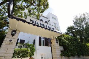 a building with a sign that reads villa delle rake at Villa delle Palme in Santa Marinella