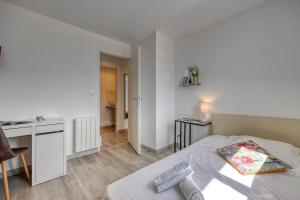 Postel nebo postele na pokoji v ubytování Coliving - Hotel Lesdigueres - Rocade