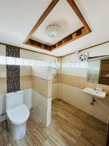 Koupelna v ubytování MAGMAI HOMESTAY & TOWER