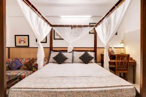 En eller flere senger på et rom på House of Comfort Noida