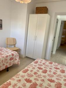 Postel nebo postele na pokoji v ubytování Playa Albir