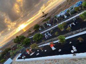 an overhead view of a group of people sitting in a park at Club JM Lanzarote in Tabayesco
