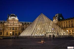 a large glass pyramid in front of a building at Les 3 E in Englebelmer