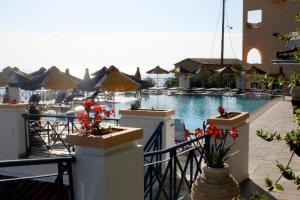 a view of a swimming pool at a resort at Lido Sofia Apartments in Agios Gordios