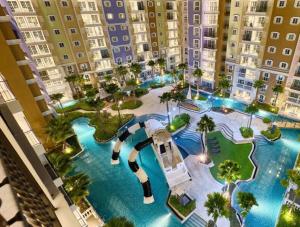 an aerial view of a swimming pool in a apartment complex at Seven Seas 2 mr.Karl in Na Jomtien