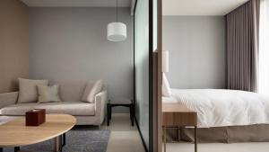 Postel nebo postele na pokoji v ubytování Jolley Hotel