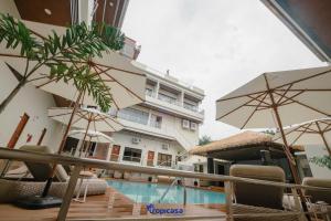 Bazén v ubytování Tropicasa Hotel nebo v jeho okolí