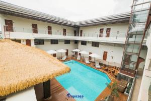 Bazén v ubytování Tropicasa Hotel nebo v jeho okolí