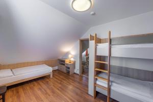 Postel nebo postele na pokoji v ubytování Penzion Terezka