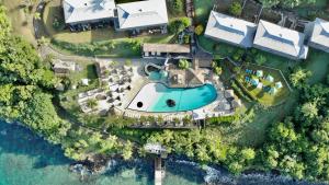 an aerial view of a house with a swimming pool at Studio 514 in Le Diamant