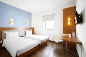 Cama o camas de una habitación en Amaris Hotel Muara Bungo - Jambi