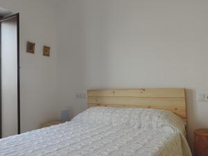 Un pat sau paturi într-o cameră la Cuadrina Barbancho in Casar de Caceres