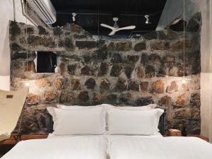 Postel nebo postele na pokoji v ubytování Yu Apartment
