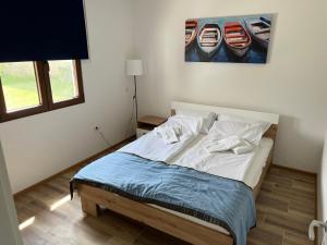 Postel nebo postele na pokoji v ubytování Apartmani M