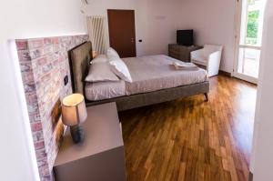 Postel nebo postele na pokoji v ubytování AMNESIA VILLAS