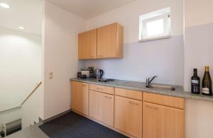 Η κουζίνα ή μικρή κουζίνα στο Apartments am Kurpark +13 φωτογραφίες