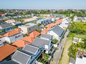 an aerial view of a city with houses at Ambara Residence Villa in Canggu
