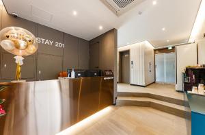 a lobby of a store with a sign on the wall at STAY201 in Jecheon