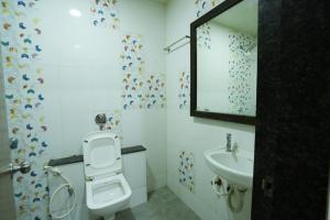 Koupelna v ubytování Hotel Anand