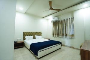 Katil atau katil-katil dalam bilik di Hotel Anand
