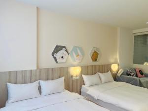 Ένα ή περισσότερα κρεβάτια σε δωμάτιο στο Canal walk inn