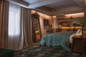 Postel nebo postele na pokoji v ubytování Unique Boutique Hotel Antibes Juan-les-Pins