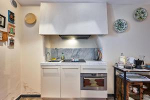 Kuchyňa alebo kuchynka v ubytovaní Baiàn Casa Vacanze