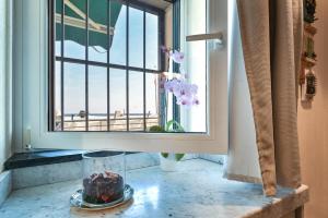 Fotografia z galérie ubytovania Baiàn Casa Vacanze v Janove