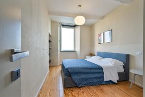 Posteľ alebo postele v izbe v ubytovaní Baiàn Casa Vacanze