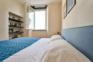 Posteľ alebo postele v izbe v ubytovaní Baiàn Casa Vacanze