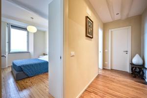 Posteľ alebo postele v izbe v ubytovaní Baiàn Casa Vacanze