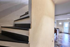 Posteľ alebo postele v izbe v ubytovaní Baiàn Casa Vacanze