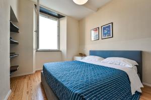 Posteľ alebo postele v izbe v ubytovaní Baiàn Casa Vacanze