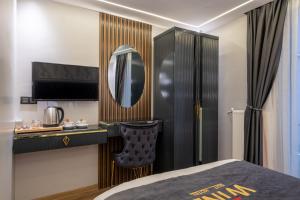 A bed or beds in a room at Wind Suit
