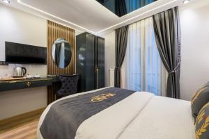 A bed or beds in a room at Wind Suit