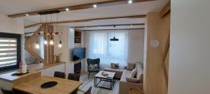 Posezení v ubytování Triple Shine Bjelasnica & Free Garage