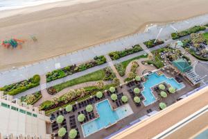 an aerial view of a hotel and the beach at Hilton Vacation Club Ocean Beach Club Virginia Beach in Virginia Beach