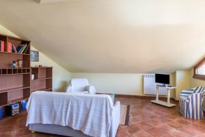 Et tv og/eller underholdning på Casa Caterina Mansarda vista Lago