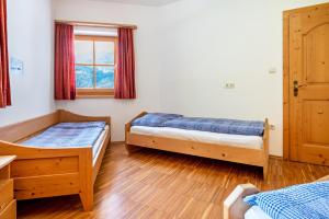 Postel nebo postele na pokoji v ubytování Lindenhof Apt 9