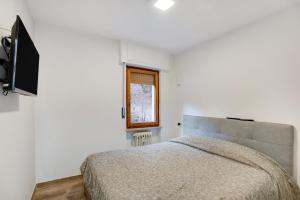 Voodi või voodid majutusasutuse Casa Gianpaolo toas