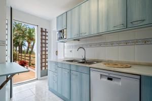 Kuchyň nebo kuchyňský kout v ubytování La Terrassa vistas al mar
