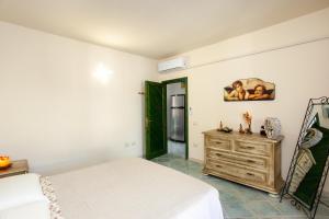 A bed or beds in a room at Casa Francesco