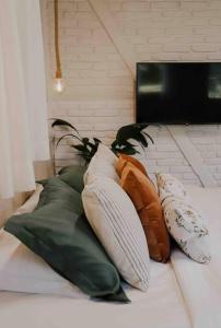 Postel nebo postele na pokoji v ubytování Casa de campo em Joinville com Hidromassagem e Lareira