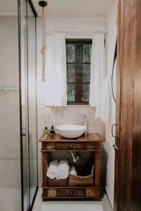 Koupelna v ubytování Casa de campo em Joinville com Hidromassagem e Lareira