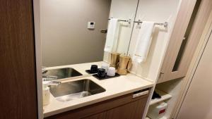Koupelna v ubytování Dormy Inn Chiba City Soga