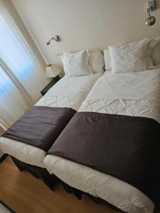 Postel nebo postele na pokoji v ubytování hotel asador versus